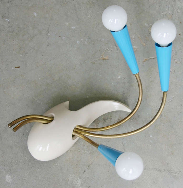 Charming biomorphic abstract ceramic and brass 3-head sconce, with blue perspex details.
