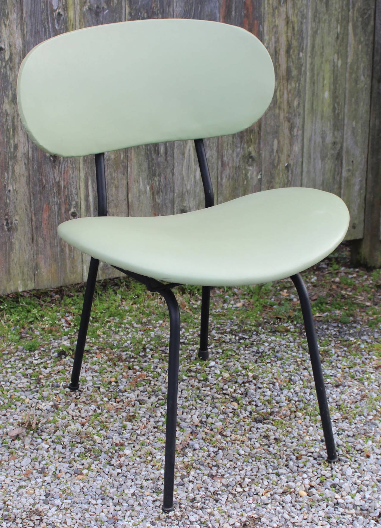 A playful pair of Rima style, metal frame, bentwood seat and back chairs in original vinyl upholstery.