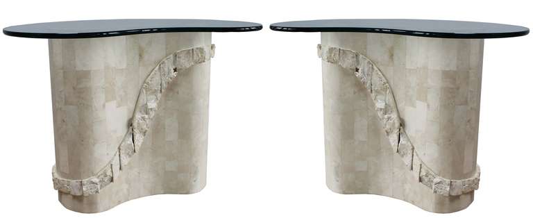 A pair of organic form tesselated marble side tables in the manner of Maitland Smith, with organic form glass tops.