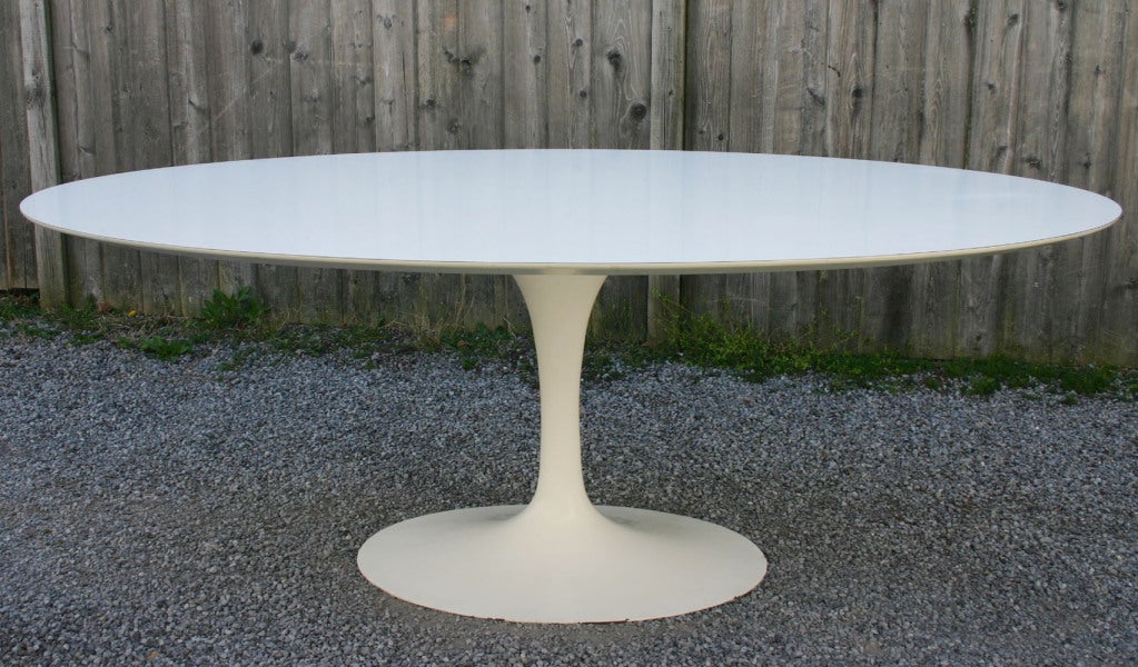 Classic Eero Saarinin for Knoll oval dining table. One owner bought in 1980. Set of 6 swivel dining chairs also available -- see website.