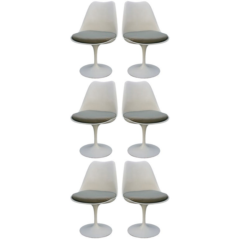 Six Eero Saarinen Swivel Dining Chairs
