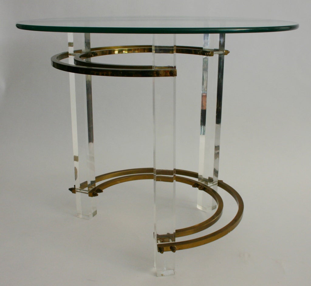 Pair modern deco style lucite and brass end tables with glass tops.