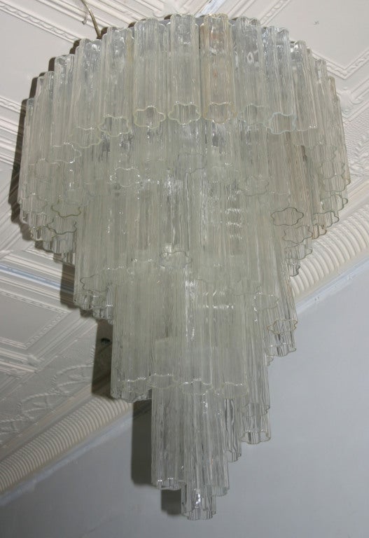 Large Murano glass textured tronchi tube spiral chandelier with chrome frame and chain.