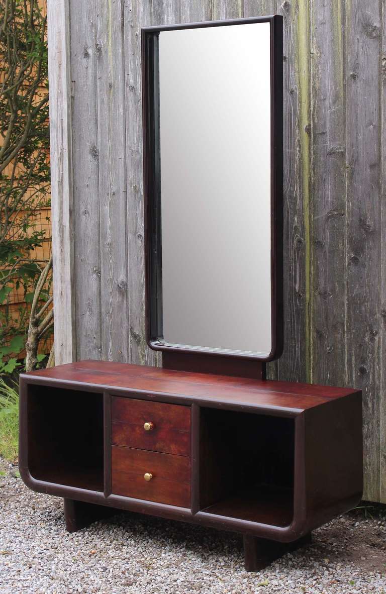 A low, modern Art Deco style Italian console with parchment top and drawers and tall, detachable mirror.<br />
<br />
Console height: 20