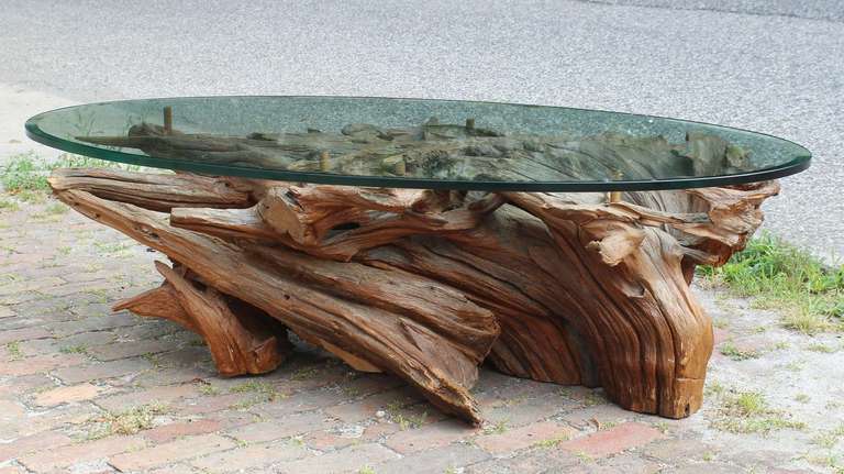 Natural cypress wood coffee table with 3/4 inch thick glass.