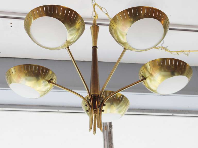 Paavo Tynell style brass chandelier with frosted glass diffusers and brass details.