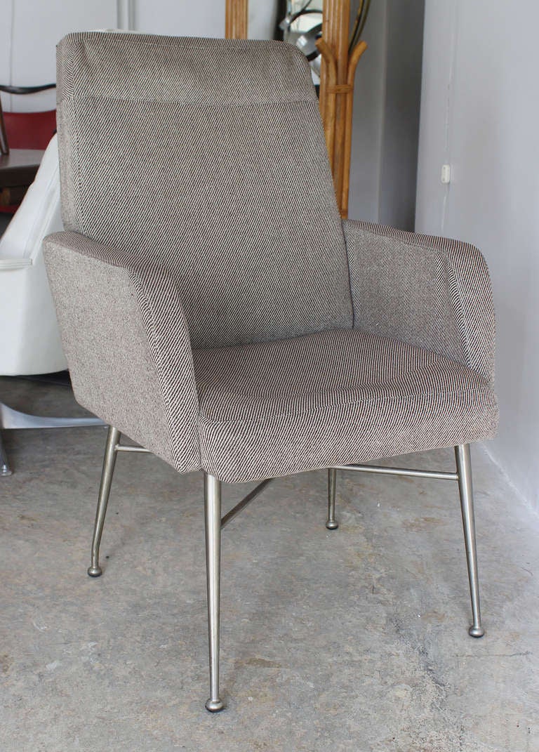 Sleek pair table or desk height Italian armchairs with metal legs, in original vintage tweed upholstery.