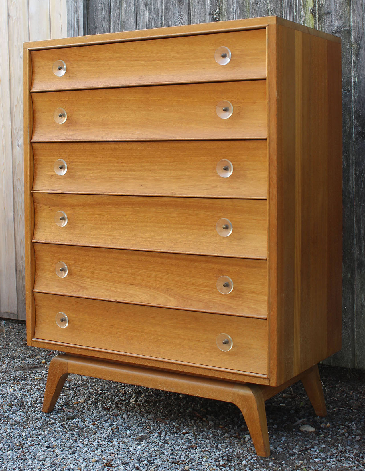 A blonde wood dresser with clear lucite pulls and brass hardware by Paul Frankl for Brown Saltman (labelled verso).

complementary delivery within 30 miles.