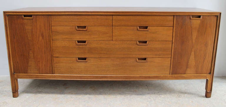 Handsome John Stuart Janus Collection walnut dresser with all wood details and inlay.