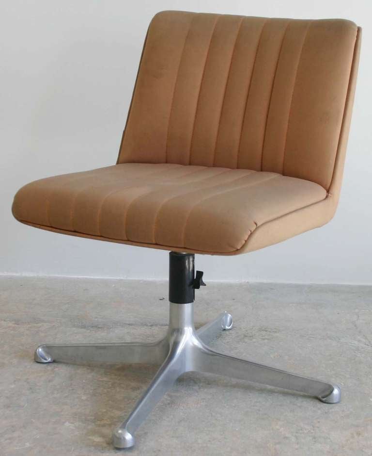 Osvaldo Borsani aluminum base adjustable swivel chair in vintage original upholstery. Ten available.