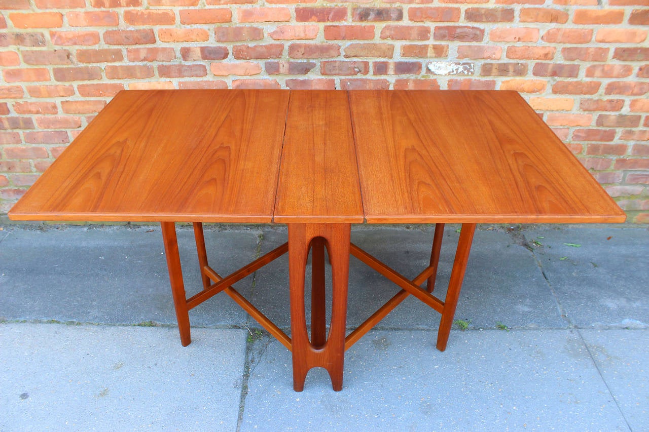 A teak drop leaf, gate leg table in the manner of Bruno Mathsson.

signed Made in Norway.

complementary shipping within 30 miles.