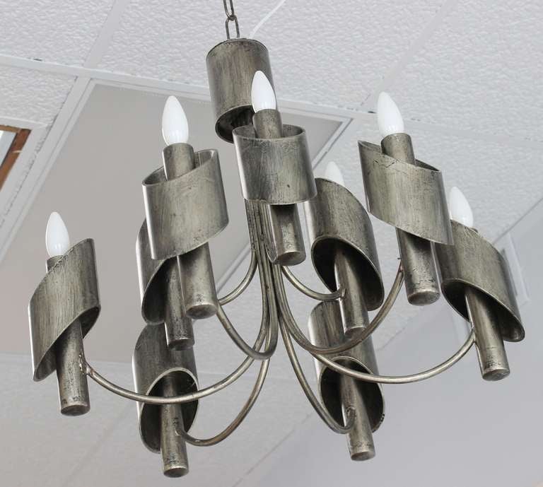 Handsome solid steel brutalist chandelier with faux black patina, designed by Marcello Fantoni.