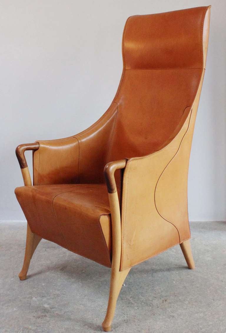 Progetti Cuoio saddle leather and solid beech wood armchair, with Brazilian ironwood arm details.

seat 19.25