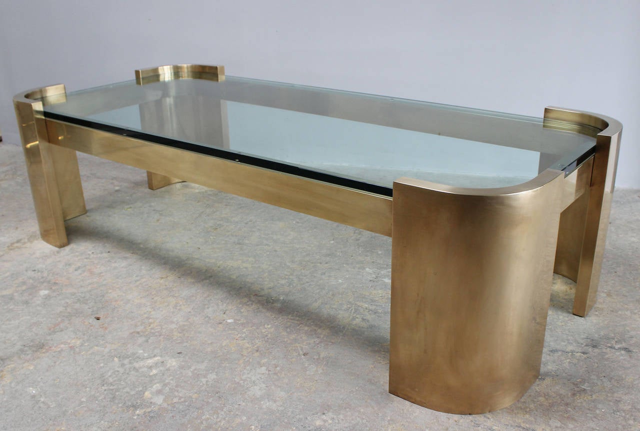 Impressive solid brass coffee table with 1/2 inch thick glass.