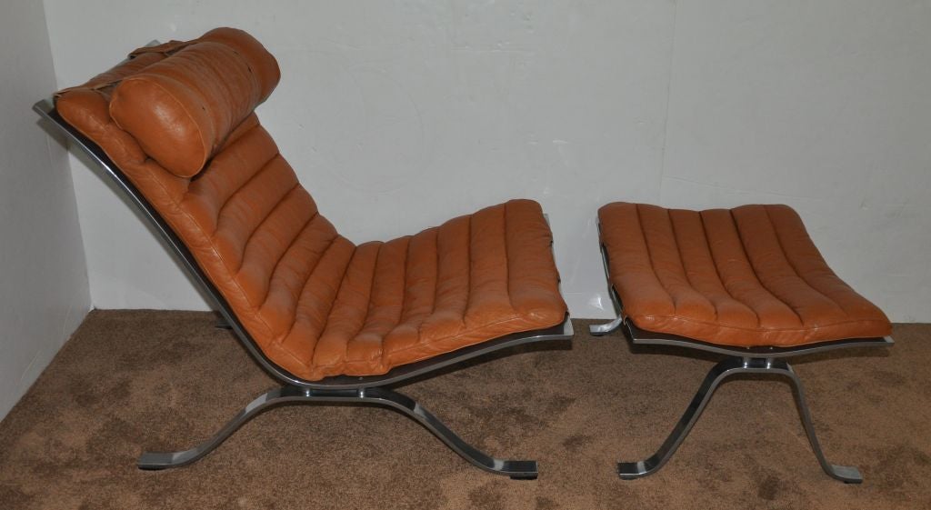 Club chair & ottoman in caramel leather by Arne Norell, excellent condition.