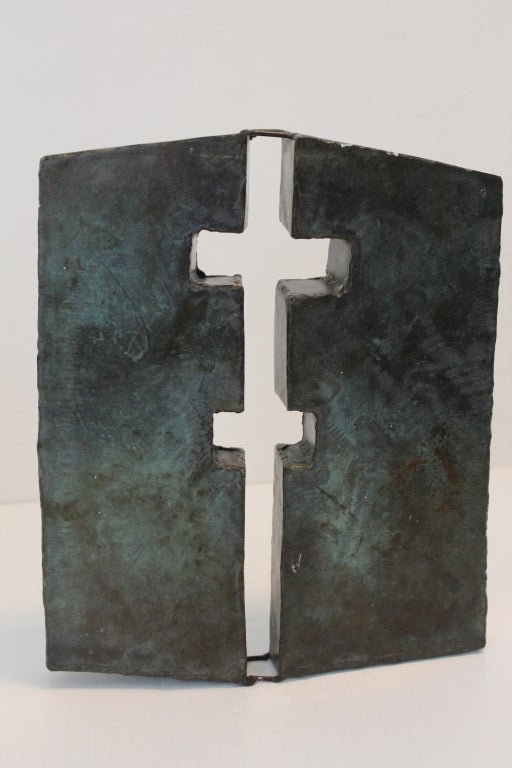 Abstract bronze sculpture, wall mounted in patinated bronze