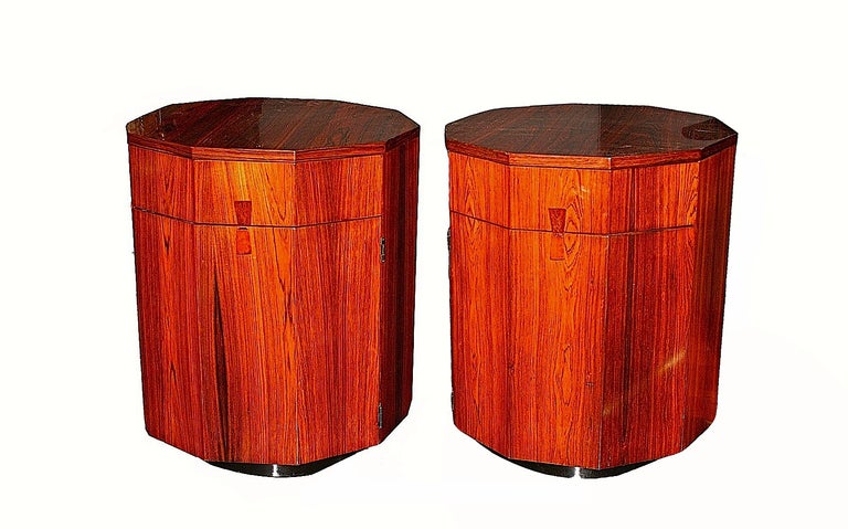 Beautifully made pair of ten-sided - or decagonal rosewood drum tables. Each with two-door opening and rosewood interior.
Mint restored condition.