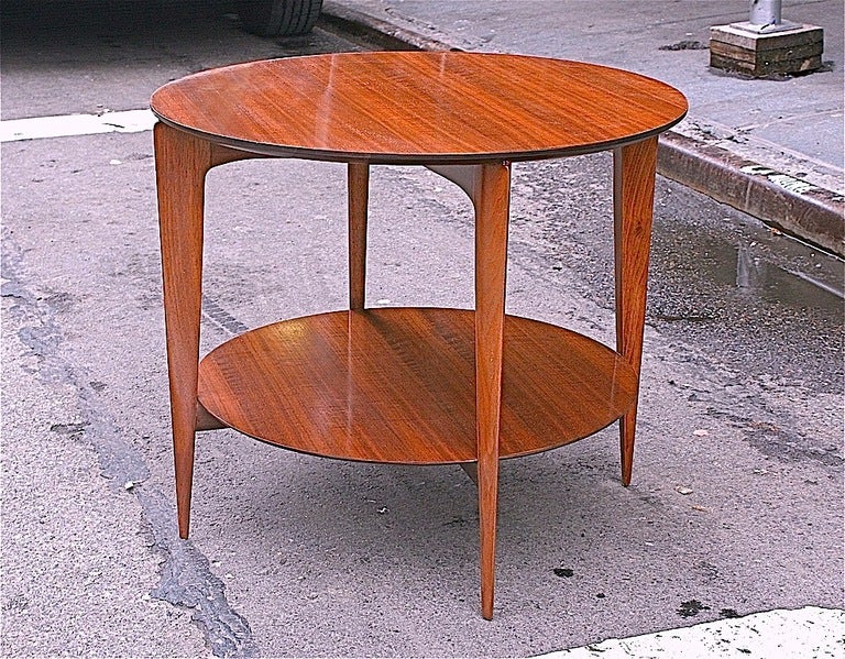 A Round Low Table in European Walnut designed and made by Gio Ponti in Italy for M. Singer & Sons in United States. Excellent Restored Condition.