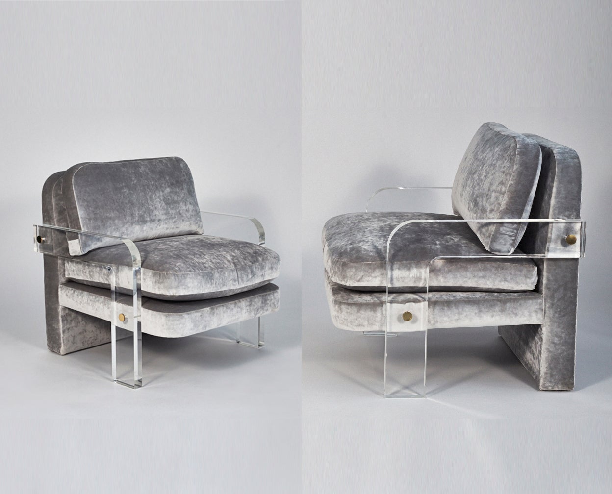 A pair of vintage Vladimir Kagan lounge chairs with 1.5
