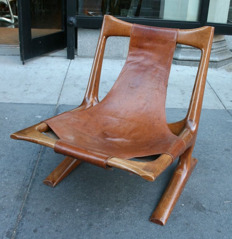 Late 20th Century Carved Oak and Leather Lounge Chair by J. Muckey