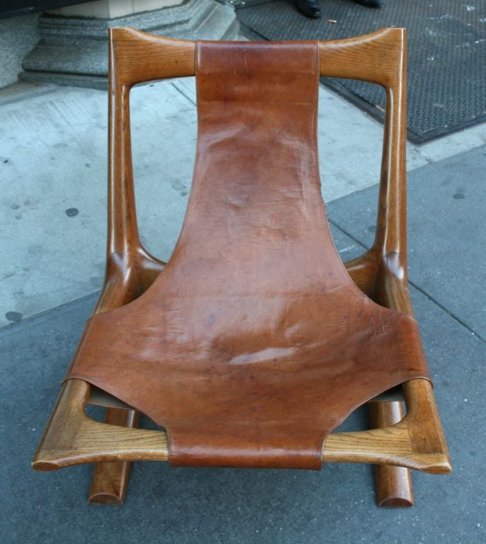 Carved Oak and Leather Lounge Chair by J. Muckey 1