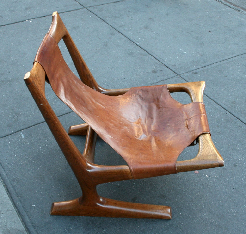 Carved Oak and Leather Lounge Chair by J. Muckey 2