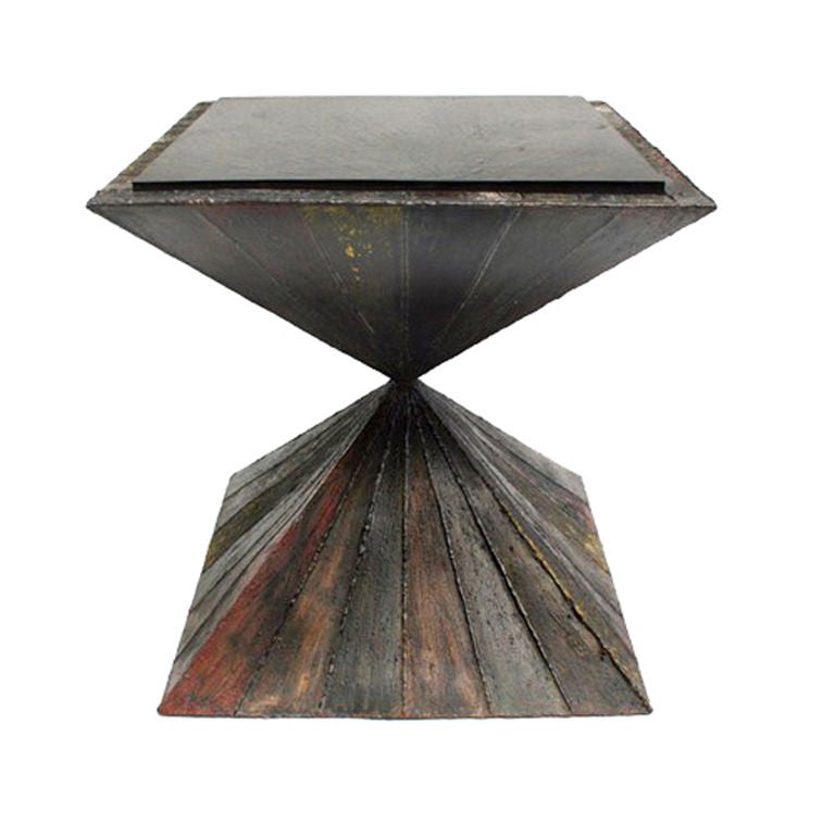 A Sculpted Steel Double-Pyramid Side Table by Paul Evans