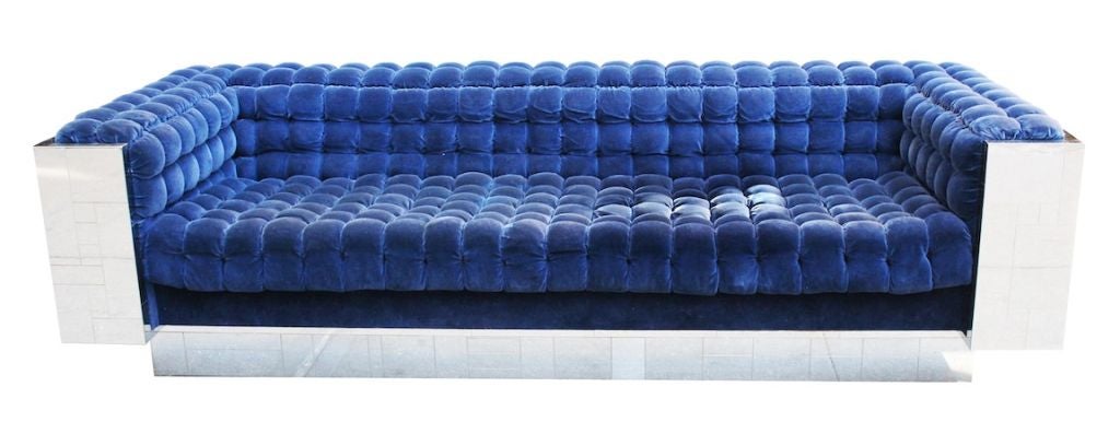 An 8 foot sofa and oversized club chair with the classic polished chrome 