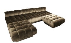 A Three-Section Deep Tufted Sofa and Ottomans by Harvey Probber