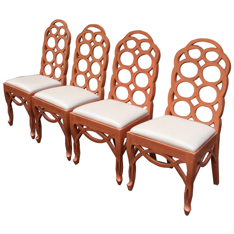 A Set of Four Lacquered Loop Back Chairs by Frances Elkins
