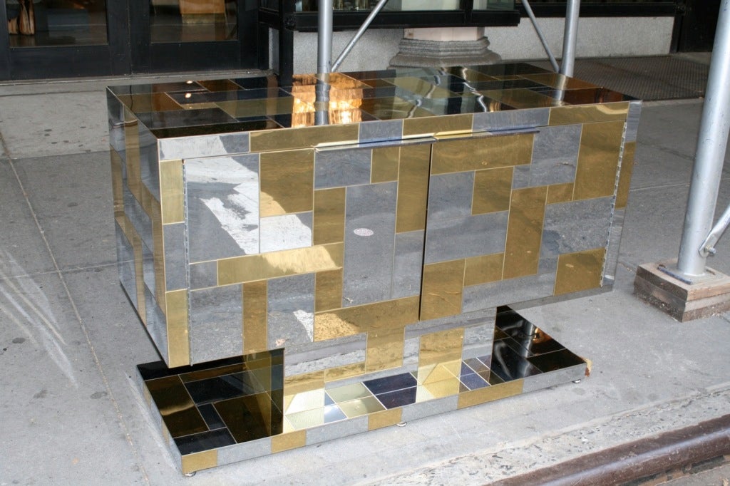 A Two-Door Chrome and Brass Cityscape Console by Paul Evans