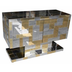A Two-Door Chrome and Brass Cityscape Console by Paul Evans
