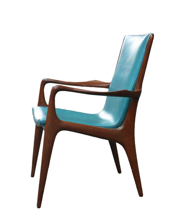 Each signed Kagan Dreyfuss New York - A Vladimir Kagan Design - in very good original condition with original teal blue leather upholstery - usable as is. Made in American Black walnut this set features two arm chairs and six side chairs.