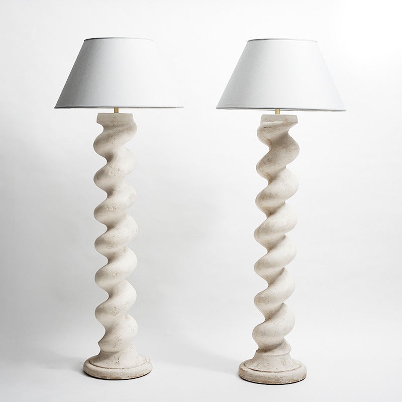 This beautiful pair of plaster standing floor lamps feature Taylor's iconic spiral forms beneath a pair of linen shades. One of the most recognized West Coast interior designers after establishing his own firm in 1956, Taylor became known for his