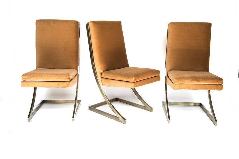 Milo Baughman, Six Bronze Dining Chairs, USA, c. 1970′s

 

A set of six dining chairs with continuos bronze frames and upholstered seats and backs designed by Milo Baughman in the 1970s.

Super comfortable with high backs and elegant