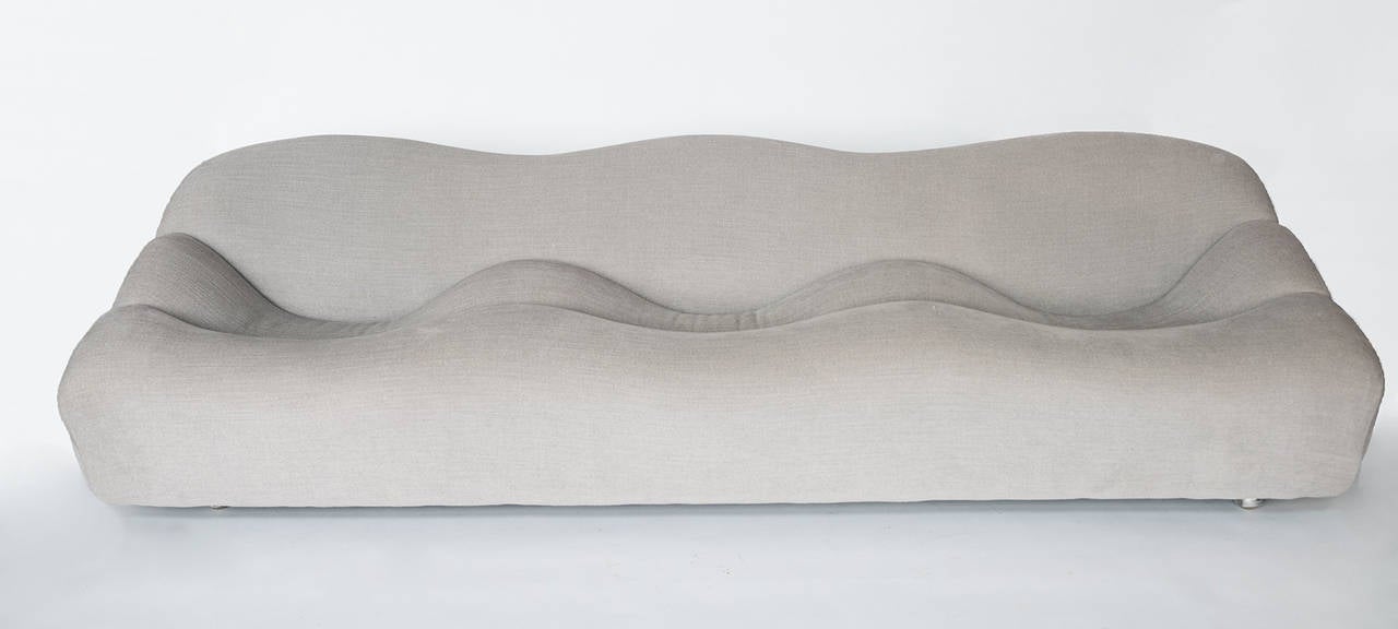 The “ABCD” sofa by Pierre Paulin 1968 is both fun and functional. Vivid grey upholstery covers a foam and fiberglass structure, with four casters at the bottom. It is in excellent original condition.

 Measures: 24.75” H x 7’10” L x 31” D.