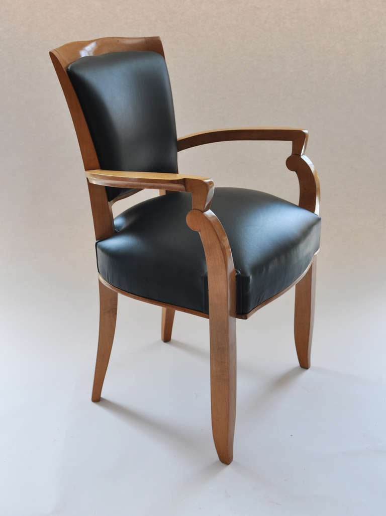 Jules Leleu (1883-1961).
Set of six beechwood armchairs, 