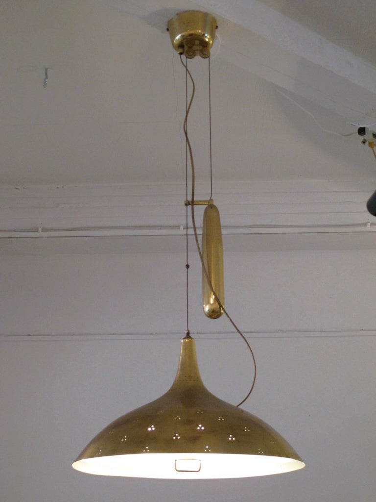 A signed Paavo Tynell (Taito Oy) adjustable height lamp. Retailed by Helsinki House. 
