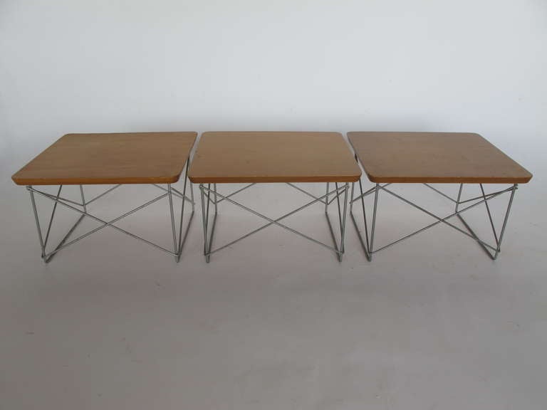 A nice set of three Herman Miller, Charles Eames, LTR tables. Birch veneer, zinc bases, all original-unrestored.