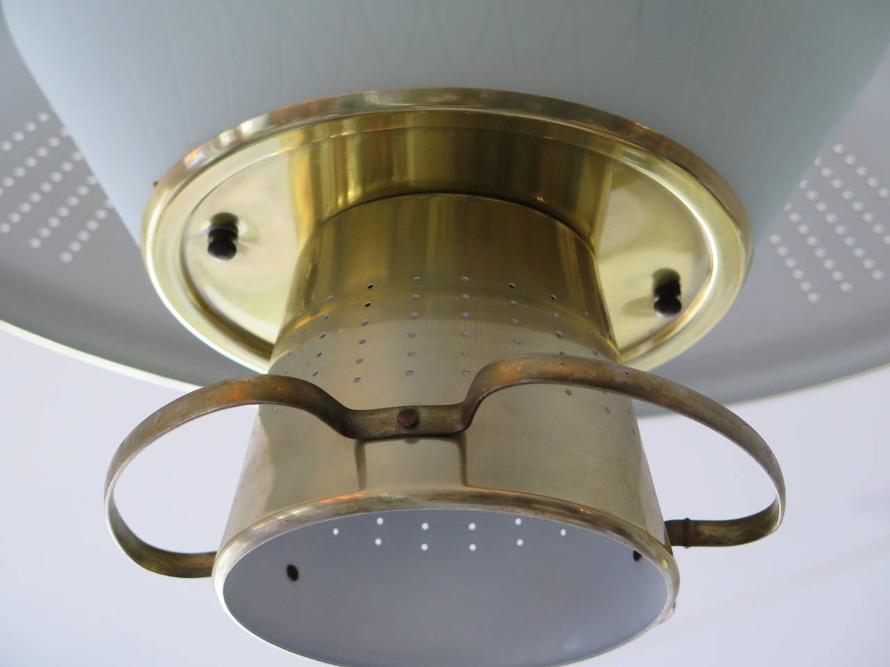 An interesting adjustable height chandelier with satin glass shade and brass perforated reflectors. From a drop of approx. 30