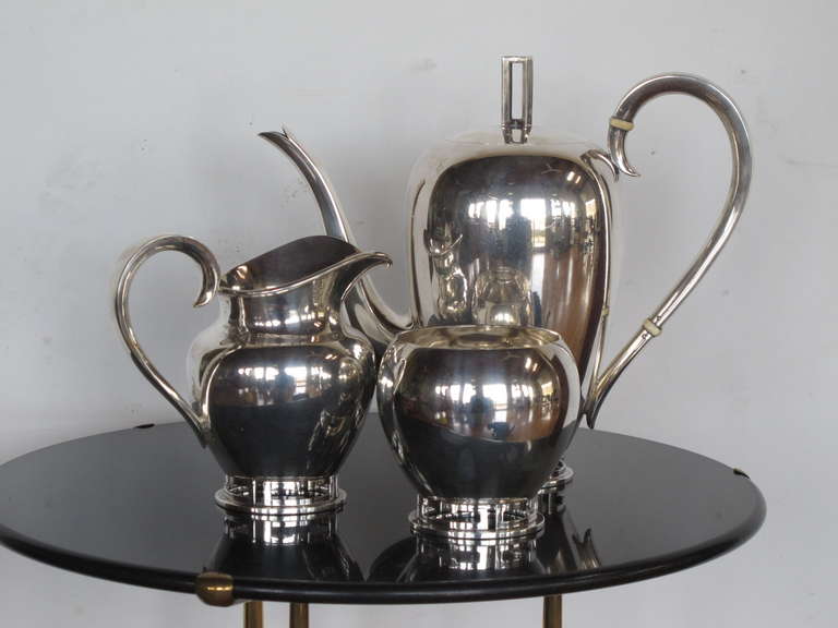 An elegant Allan Adler Tea Set in the Greek Key style. Sterling silver, total weight about 1700 grams. The teapot measures approximately 9.25