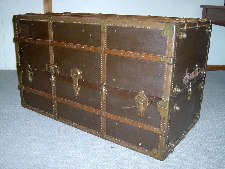 A large wardrobe trunk made by Henry Likly of Rochester, N.Y., established 1844.
This rare American trunk was beautifully made in the same style of the famous, expensive ones.
Extremely solid, and equipped with casters and great oak slats.
It is