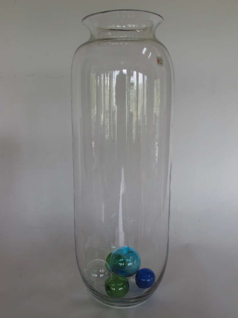 A large, decorative, clear glass Blenko vessel. Measuring about 25
