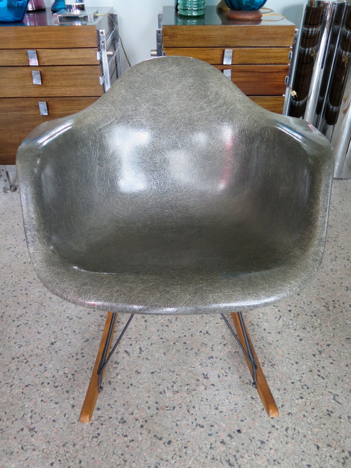 An excellent example of 1950s elephant grey, Eames rocking chair (RAR). Birch runners, black painted base, original. Shell very clean-no chips or scratches, retaining original, early Zenith plastics label.