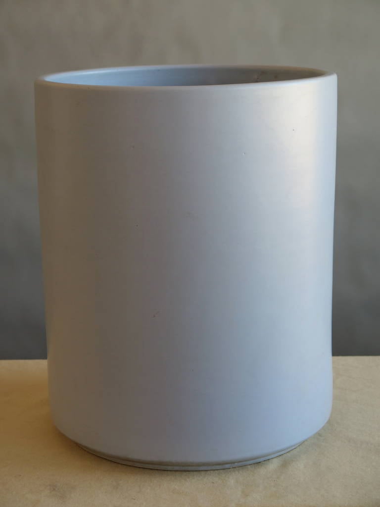 A classic light grey, ceramic vessel by Gainey Pottery, Laverne CA. Shiny glaze, unused, vintage stock. Measures 20