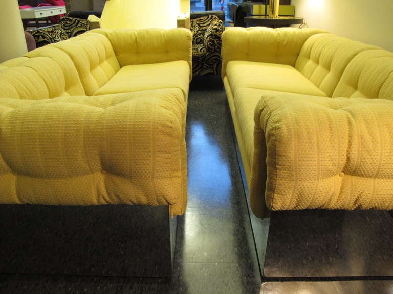 A Pair of Milo Baughman Sofas with Polished Chrome Bases 1