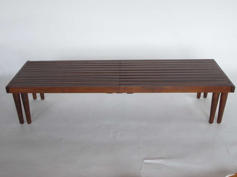 An unusual expanding bench by Brown Saltman. Length extends from 55.5