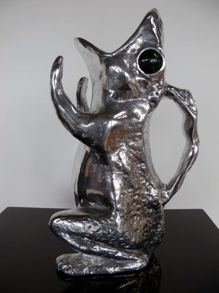 A charming frog pitcher by Arthur Court in cast aluminum with jade eyes.