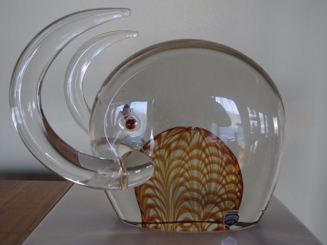 A charming glass elephant, by Cendese, Murano, Italy. With original label.