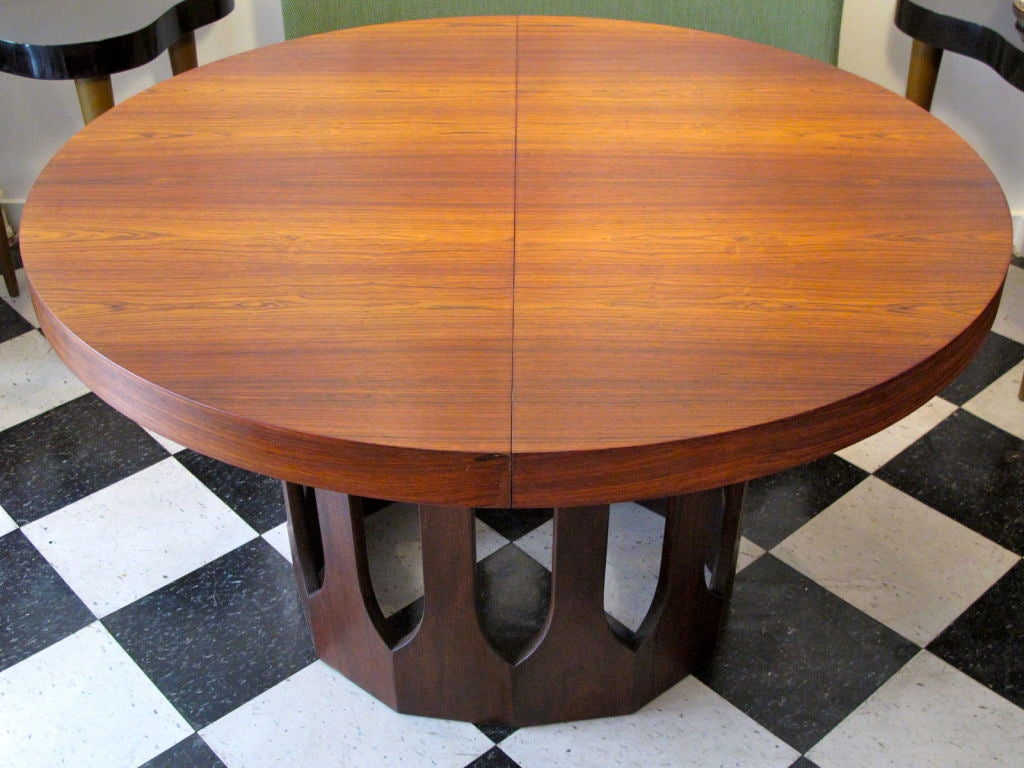 A rare, finely crafted, dining table by Harvey Probber (# 1287). Arch-like pedestal base (mahogany) suppports a Brazilian rosewood top, round (48